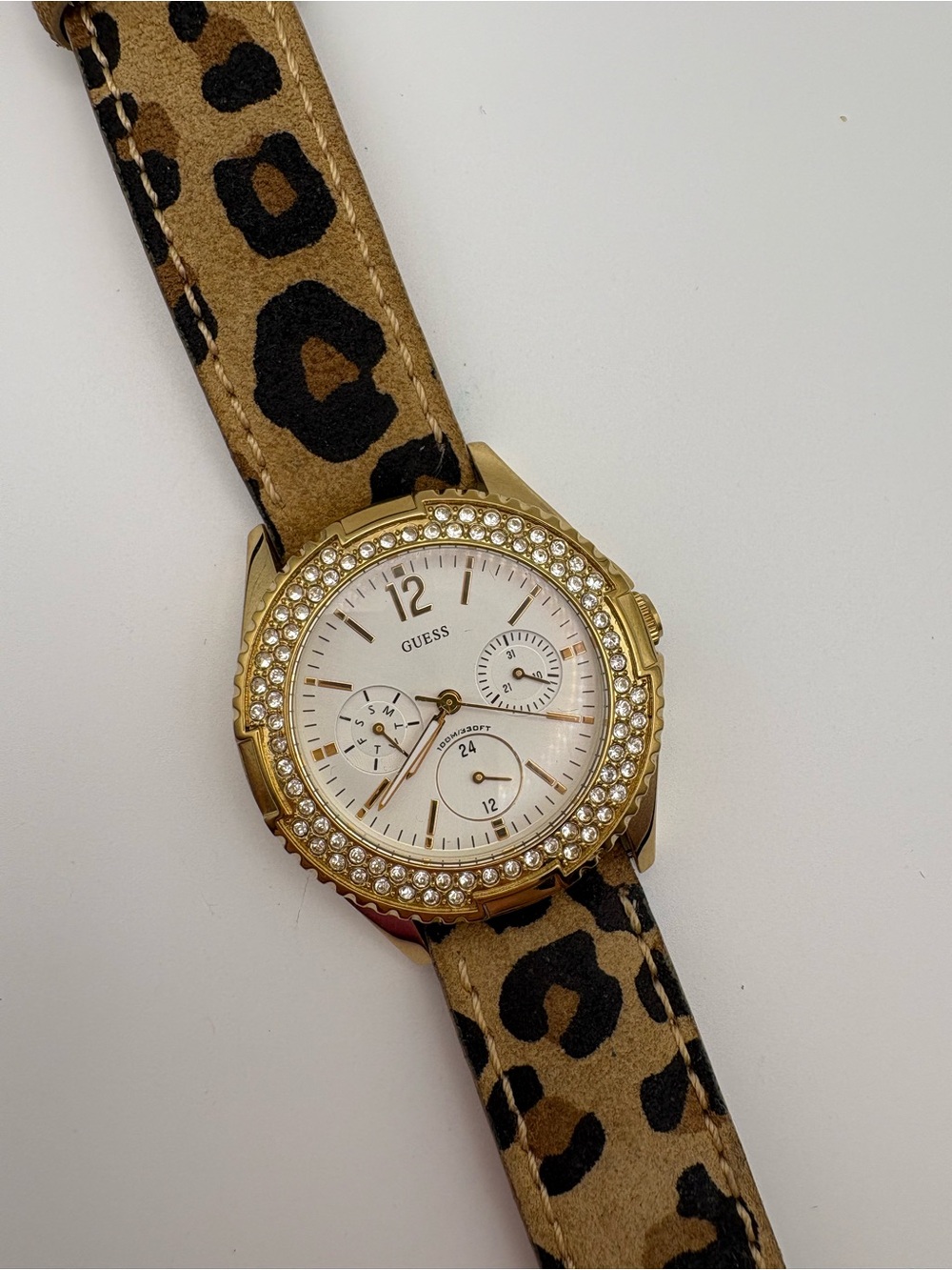 GUESS Women’s Gold Crystal Bezel Watch with Leopard Print Strap New Battery